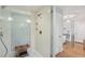 Walk-in shower with a glass door, tiled walls, and custom shower fixtures at 96 Dartmouth Ave, Avondale Estates, GA 30002