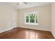 Bedroom with hardwood floors, bay window, and closet at 96 Dartmouth Ave, Avondale Estates, GA 30002