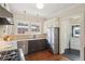 Bright kitchen featuring stainless steel appliances, granite countertops, and hardwood floors at 96 Dartmouth Ave, Avondale Estates, GA 30002