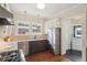 Well-appointed kitchen with stainless steel appliances, granite countertops, and hardwood floors at 96 Dartmouth Ave, Avondale Estates, GA 30002