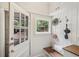 Welcoming mudroom with built-in bench, storage hooks, and natural light at 96 Dartmouth Ave, Avondale Estates, GA 30002