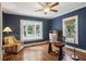 Office room with hardwood floors, a desk, and a bay window at 96 Dartmouth Ave, Avondale Estates, GA 30002