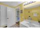 Bathroom with white sink, neutral wall color, and large mirror at 222 Mossy Pl, Alpharetta, GA 30005