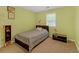 Bedroom with green walls, carpet, and furniture at 222 Mossy Pl, Alpharetta, GA 30005