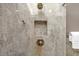 Close-up of walk-in shower featuring rainfall showerhead and built-in niche at 222 Mossy Pl, Alpharetta, GA 30005