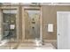 Walk-in shower with glass door and showerhead at 222 Mossy Pl, Alpharetta, GA 30005