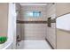 New shower with tiled walls and accent mosaic at 222 Mossy Pl, Alpharetta, GA 30005