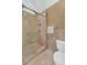 Walk-in shower with bench, built-in niche and glass door at 222 Mossy Pl, Alpharetta, GA 30005