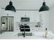 Modern kitchen features stainless steel appliances, sleek white cabinets, and stylish backsplash at 2276 Sutton Se St, Atlanta, GA 30317