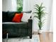 Comfortable living room area with plush couch and decorative plant at 2276 Sutton Se St, Atlanta, GA 30317
