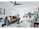Inviting open-concept living room boasts modern décor with a view of the kitchen at 2276 Sutton Se St, Atlanta, GA 30317