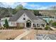 Beautiful clubhouse featuring stone accents, manicured landscaping, and well maintained walkways and common areas at 331 Franklin Ln, Acworth, GA 30102