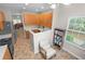 Open kitchen concept leading to the living room with wood cabinets and stainless steel appliances at 331 Franklin Ln, Acworth, GA 30102