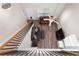 Open-concept living room featuring hardwood floors, a fan, and a comfortable seating area at 331 Franklin Ln, Acworth, GA 30102