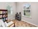 Bright office space featuring two large windows providing natural light and a cozy reading nook at 331 Franklin Ln, Acworth, GA 30102