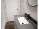 Bathroom with a modern sink, sleek black faucet, and stylish countertop at 345 Forest Valley Rd, Lawrenceville, GA 30046