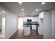 Updated kitchen with white cabinets, stainless steel appliances and a counter island at 345 Forest Valley Rd, Lawrenceville, GA 30046