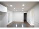 Bright kitchen and dining area with recessed lighting and access to other rooms of the house at 345 Forest Valley Rd, Lawrenceville, GA 30046