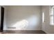 Bright living room features hardwood floors and a welcoming front door with oval window at 345 Forest Valley Rd, Lawrenceville, GA 30046