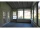Bright sunroom with multiple windows, door and outdoor views, creating a relaxing space at 345 Forest Valley Rd, Lawrenceville, GA 30046