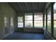 Bright sunroom with multiple windows, door and outdoor views, creating a relaxing space at 345 Forest Valley Rd, Lawrenceville, GA 30046