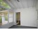 Bright sunroom with multiple windows, a door to the outside, and a light-colored floor at 345 Forest Valley Rd, Lawrenceville, GA 30046