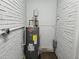 Newer hot water heater installed, inside of the basement utility room at 345 Forest Valley Rd, Lawrenceville, GA 30046