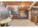 Unfinished basement with shelving, an accent table, and exposed ceiling for personalized finishing at 3741 Windhurst Dr, Lilburn, GA 30047