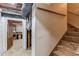 Unfinished basement with exposed ducts and staircase offers potential for customization and additional living space at 3741 Windhurst Dr, Lilburn, GA 30047