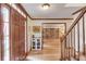 Entryway features hardwood floors, staircase, and an open view to the living spaces at 3741 Windhurst Dr, Lilburn, GA 30047