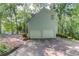 Two car garage and long driveway, offering convenience and plenty of parking space at 3741 Windhurst Dr, Lilburn, GA 30047