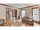 Inviting living room with hardwood floors, natural light, and a comfortable seating area at 3741 Windhurst Dr, Lilburn, GA 30047