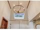 Main bathroom featuring a skylight, glass enclosed shower, and stylish fixtures at 3741 Windhurst Dr, Lilburn, GA 30047