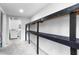 Unfinished basement with built-in storage shelves and access to the laundry area at 4131 West Village Pkwy, Ellenwood, GA 30294