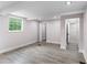 Bright bedroom with laminate flooring and ample natural light at 4131 West Village Pkwy, Ellenwood, GA 30294