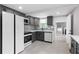 Stylish kitchen featuring white countertops and sleek gray cabinetry at 4131 West Village Pkwy, Ellenwood, GA 30294