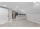 Kitchenette featuring stainless steel appliances, black accents, and grey flooring at 4131 West Village Pkwy, Ellenwood, GA 30294