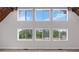 Bright living room with large windows and stunning views of nature at 4131 West Village Pkwy, Ellenwood, GA 30294