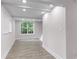 Inviting living room featuring modern flooring and recessed lighting at 4131 West Village Pkwy, Ellenwood, GA 30294
