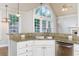 Kitchen with granite countertops and stainless steel dishwasher and sink at 7240 Highbrook Cir, Cumming, GA 30041
