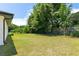 Large, grassy backyard with a fence for privacy and room to enjoy the outdoors at 10116 Straphinge Trl, Covington, GA 30014