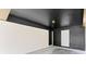 A carport with brick wall and black-painted wood ceiling at 10116 Straphinge Trl, Covington, GA 30014