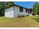 A charming home with white painted brick and a well-maintained lawn at 10116 Straphinge Trl, Covington, GA 30014