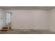 Unfinished basement offering potential for customization and featuring exposed stair and door access at 3512 Valley Chase Ct, Lithonia, GA 30038