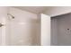 Updated bathroom featuring a white shower-tub and chrome shower head at 3512 Valley Chase Ct, Lithonia, GA 30038