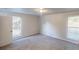 Bright bedroom with carpet and windows with blinds at 3512 Valley Chase Ct, Lithonia, GA 30038