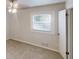 Bedroom with neutral carpeting, window with blinds, and ceiling fan at 3512 Valley Chase Ct, Lithonia, GA 30038