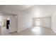 Bright open-concept living space featuring wood floors and an abundance of natural light at 3512 Valley Chase Ct, Lithonia, GA 30038