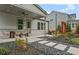 Beautiful backyard with a covered patio, fire pit area, and well-manicured landscaping, perfect for outdoor enjoyment at 4775 Wyat Farm Overlook, Cumming, GA 30040
