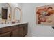 Modern bathroom featuring double sinks, sleek fixtures, and a stylish art piece for a spa-like experience at 4775 Wyat Farm Overlook, Cumming, GA 30040